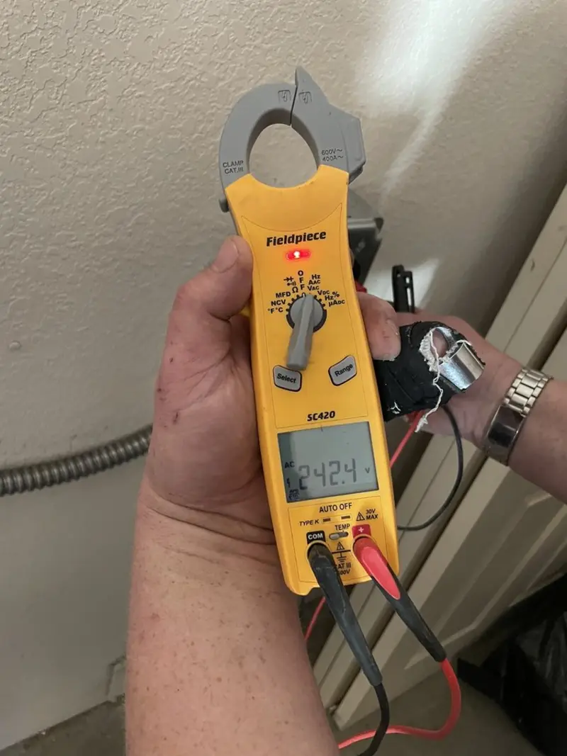 Voltage testing with clamp meter during Aluminum Wiring Replacement in Sparta